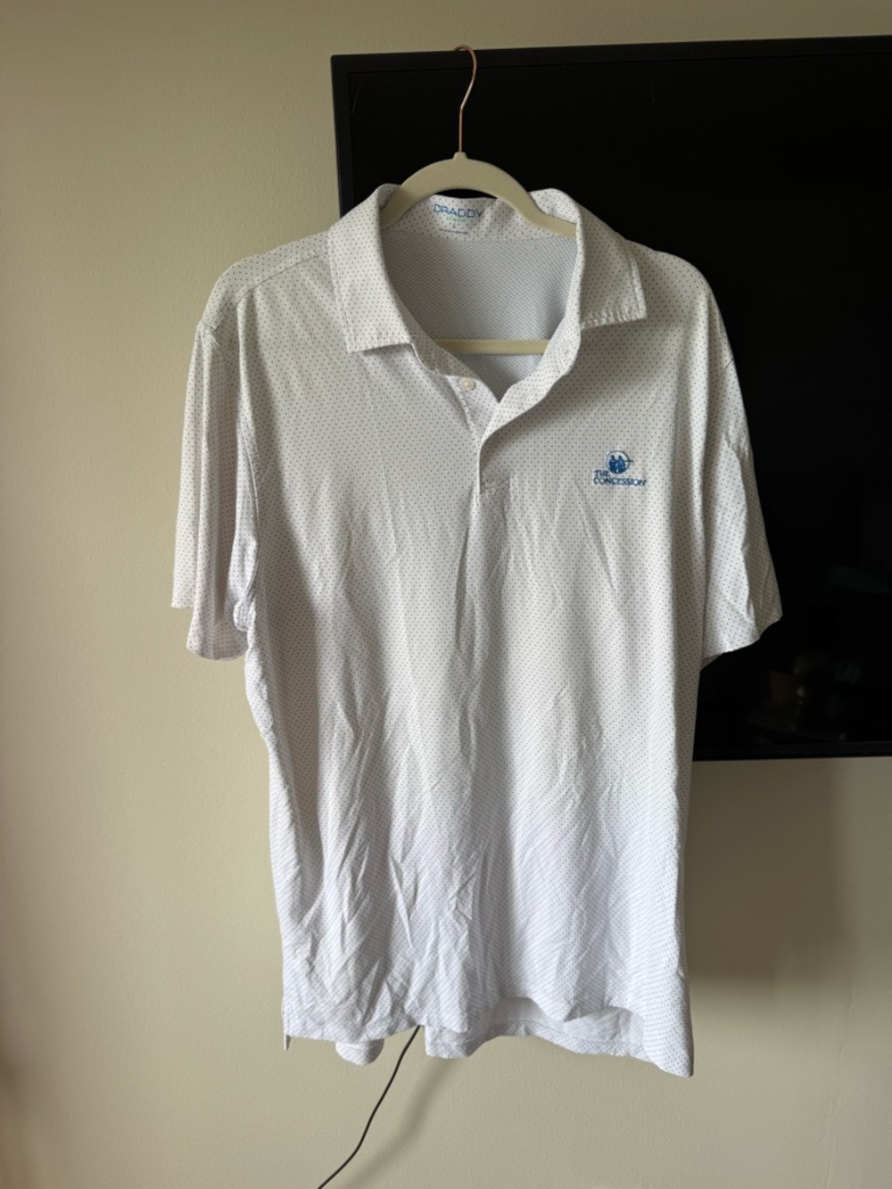 The Concession Club Men’s White Polo with Blue Logo